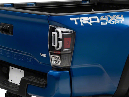 Raxiom XW Series Sequential LED Tail Lights; Black Housing; Clear Lens (16-23 Tacoma)