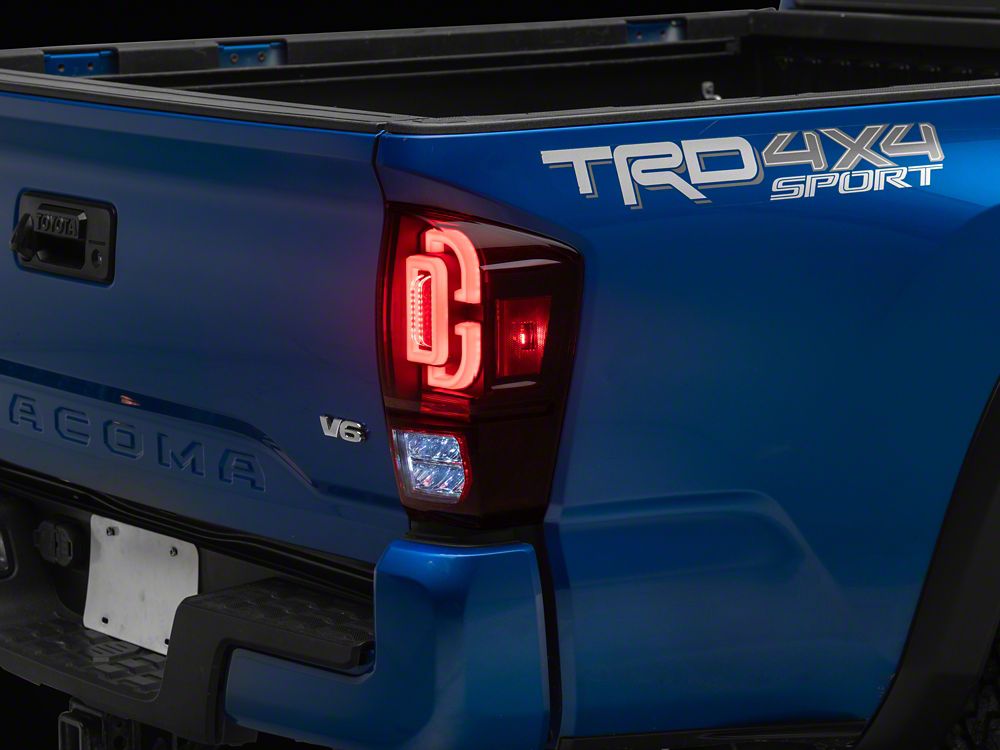 Raxiom XW Series Sequential LED Tail Lights; Black Housing, Red Lens (16-23 Tacoma)