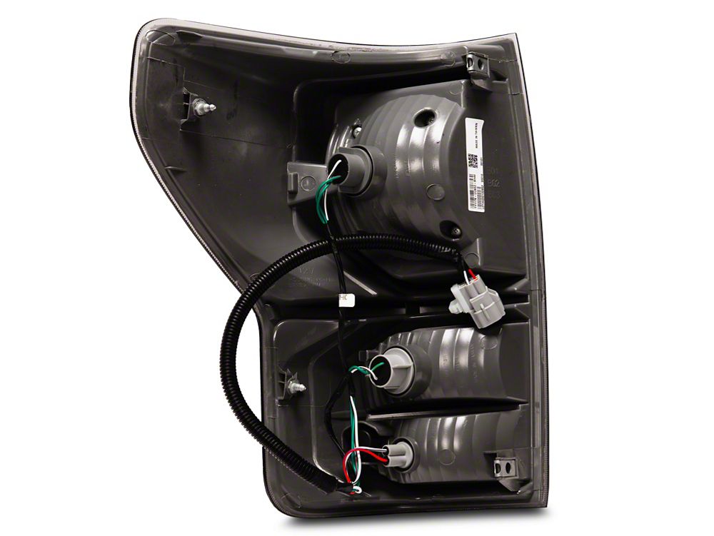 Raxiom Axial Series Dual C-Shape LED Tail Lights; Black Housing; Smoked Lens (07-13 Tundra)
